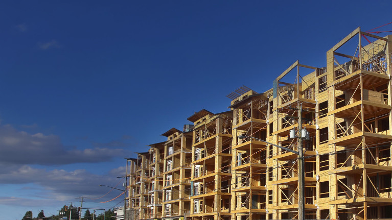 A large construction site featuring a building in progress